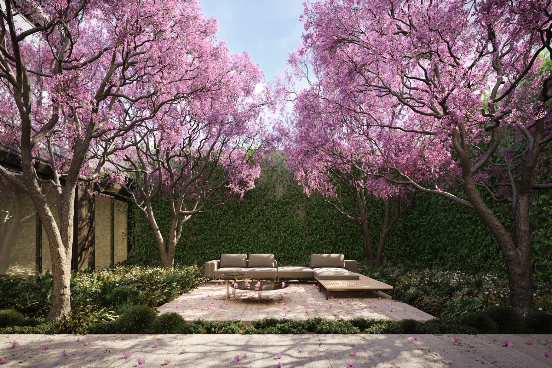 Patio con lapachos en flor y estar exterior